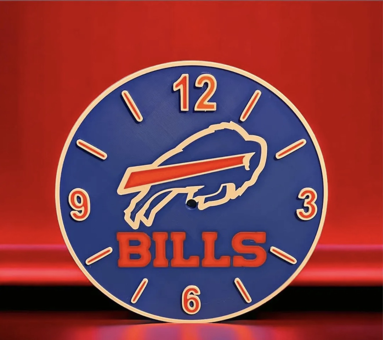 Custom blue and red 3D printed sports-themed clock face.
